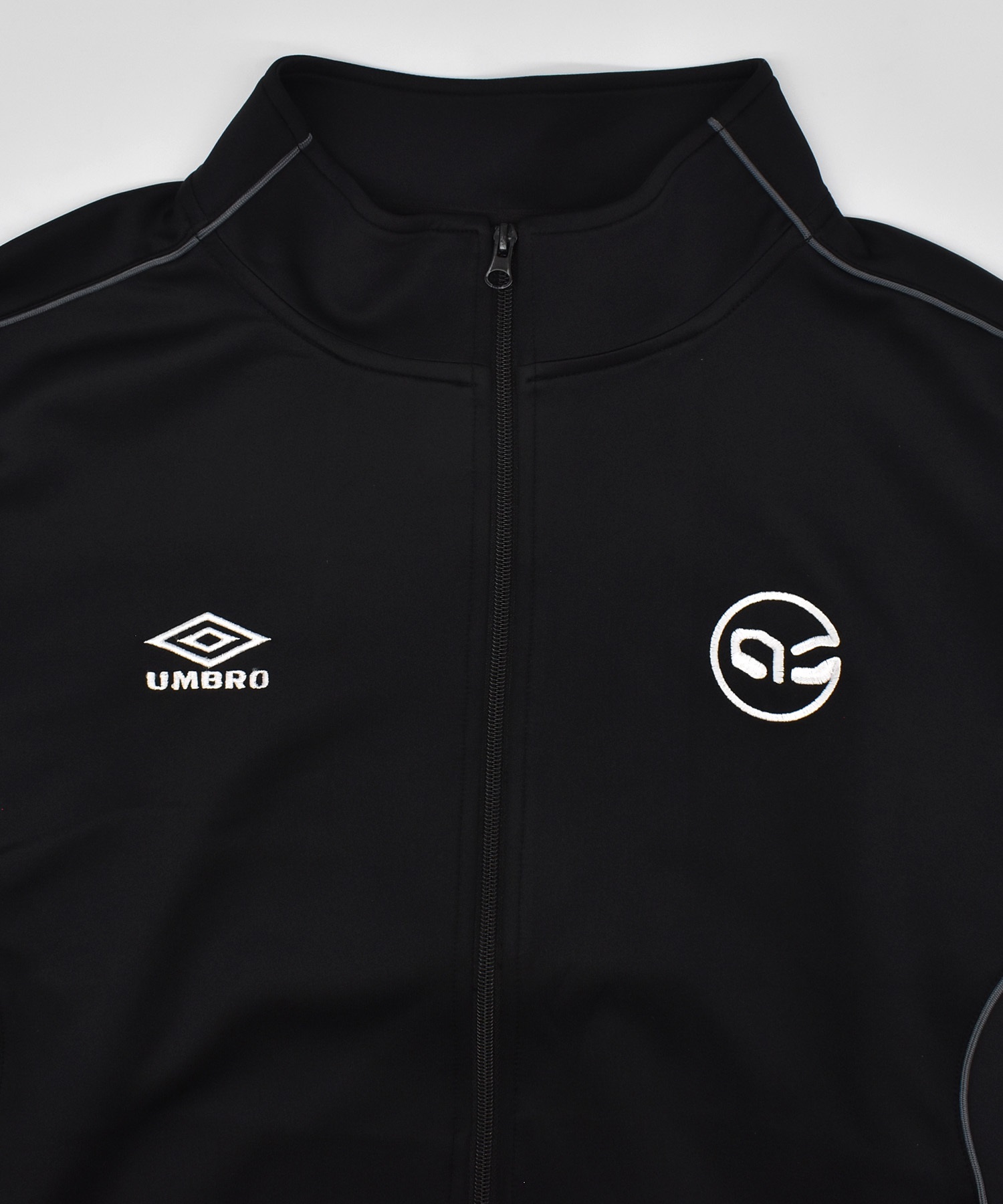 UMBRO アンブロ × ALAN SHIRAHAMA カット トラックジャケット UM26SSAL-TP01(BLACK-M)