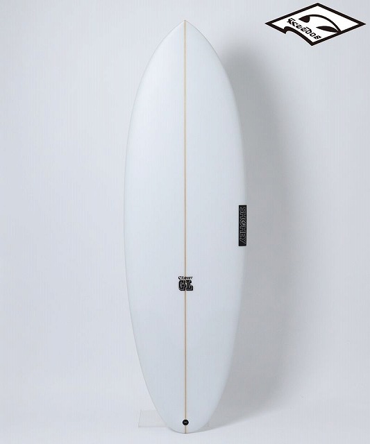b-sX1IWy4g - SHOP NEWS | ムラサキスポーツオンラインストア 通販 White surfboard standing upright on a light background, features a brown stringer and small brand logos along the deck.