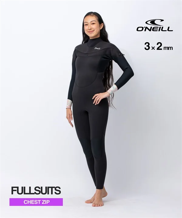 Woman wearing a black O’Neill chest-zip 3x2 mm wetsuit, standing with hands on hips.